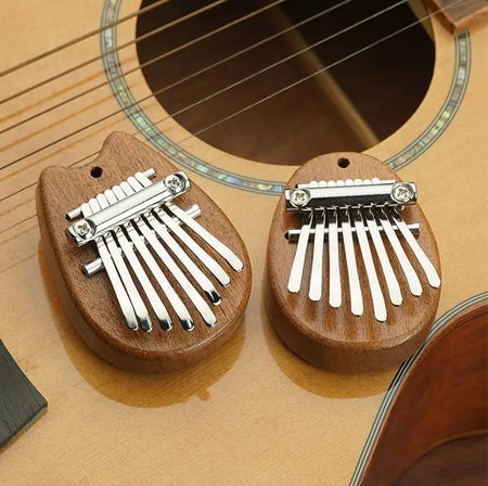 8 Key Mini Kalimba &ndash; Exquisite Finger Piano Pendant Gift