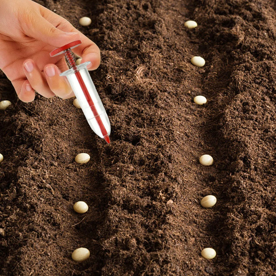 Piantatore di semi manuale in plastica a siringa portatile