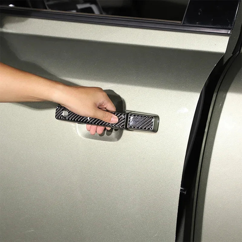 Mjuka kolfiberexteriöra dörrhandtagsklistermärken Defender 110