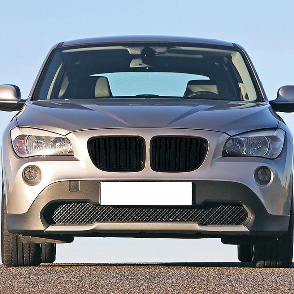 Grille avant pour BMW E84 X1, design à double lamelle en ABS, finition noir brillant, look racing