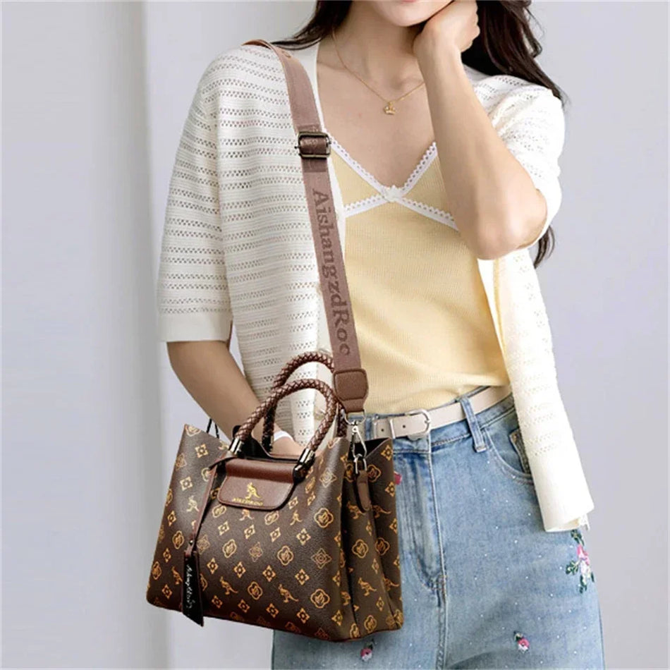 Tyylikäs naisten käsilaukku, jossa on ainutlaatuinen kahvasuunnittelu, tyylikäs kuvio, tilava sisustus, säädettävä hihna