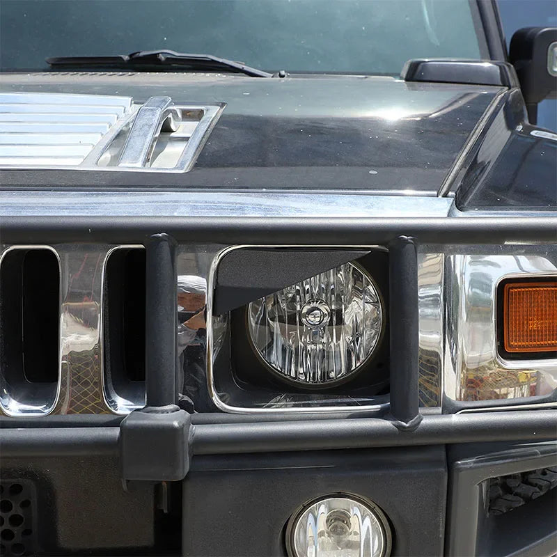 Copertura faro in acciaio al carbonio nero con occhi arrabbiati per Hummer H2