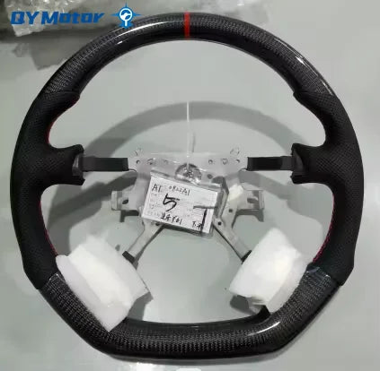 Volan Nissan Patrol Y61 cu fibră de carbon reală și piele perforată