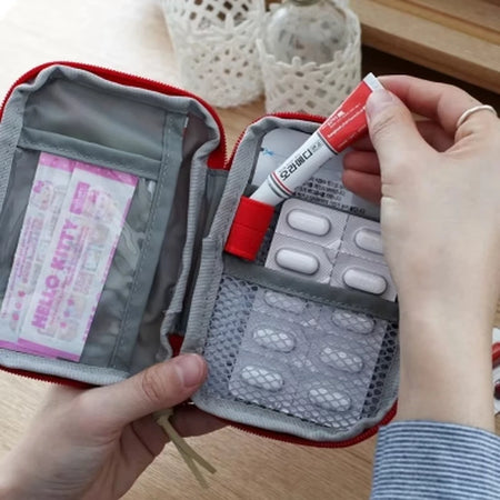 Compact Portable First Aid Kit for Travel and Outdoor Emergencies